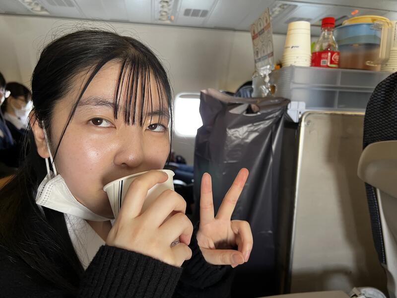 飛行機内にて